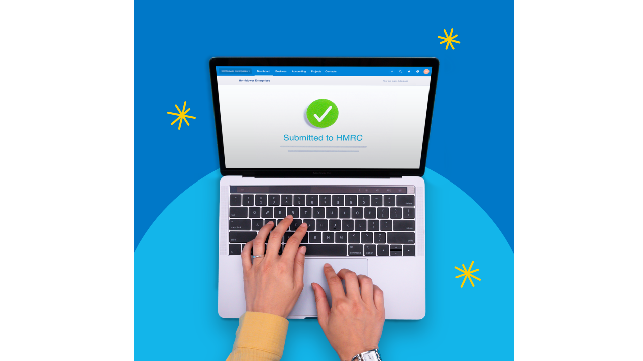 Person using Making Tax Digital software on a laptop, with the message ‘submitted to HMRC’ and a green tick.