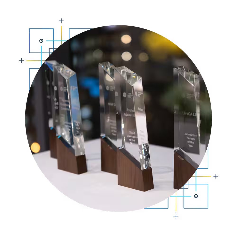 Trophies for Xero Awards Canada displayed on a table.