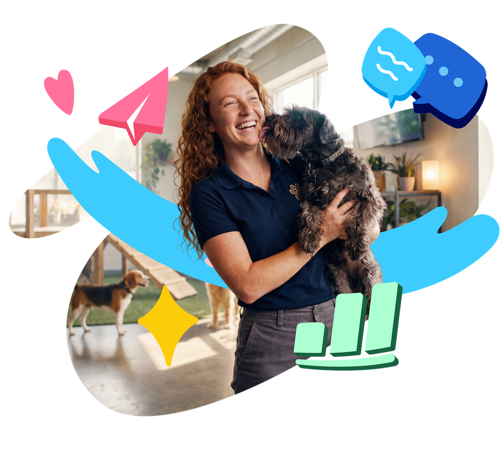 Woman smiling while holding a dog in a bright, modern office space